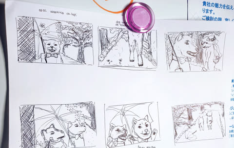 Hand-drawn sketches of dogs walking and under umbrellas.